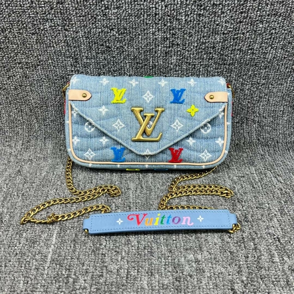 Louis Vuitton Handbags - 100%  Authentic Louis Vuitton New Wave Blue Monogram Denim Satchel